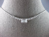 .51CT DIAMOND 14KT WHITE GOLD ROUND & BAGUETTE INVISIBLE FILIGREE LOVE NECKLACE