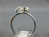ESTATE 1.33CT DIAMOND & AAA WHITE TOPAZ 14KT WHITE GOLD LOVE KNOT SOLITAIRE RING