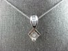 .56CT DIAMOND 14K WHITE GOLD ROUND BAGUETTE & PRINCESS INVISIBLE SQUARE PENDANT