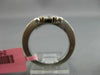 ESTATE WIDE 18KT WHITE GOLD FUN RING. 3D CLUSTER CRISS CROSS ETOILE DESIGN