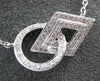 ESTATE .29CT DIAMOND 18KT WHITE GOLD CIRCLE OF LIFE SQUARE LOVE KNOT FUN PENDANT