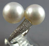 LARGE .93CT DIAMOND & AAA SOUTH SEA PEARL 18KT WHITE GOLD CRISS CROSS LOVE RING