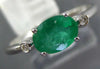 .70CT DIAMOND & AAA EMERALD 14KT WHITE GOLD OVAL & ROUND 3 STONE FRIENDSHIP RING