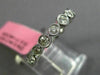 ESTATE .57CT ROUND DIAMOND 18KT WHITE GOLD SEMI ETERNITY BEZEL ANNIVERSARY RING
