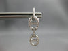 .68CT DIAMOND 18KT WHITE GOLD 3D CLASSIC DOUBLE LOVE KNOT FUN HANGING EARRINGS