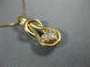 ESTATE .25CT DIAMOND 14KT YELLOW GOLD HEART LOVE KNOT INFINITY FLOATING PENDANT