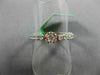 ESTATE .68CT DIAMOND 18KT WHITE & ROSE GOLD FLOWER TENNIS ETERNITY FLEXIBLE RING