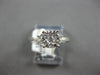 .33CT DIAMOND 18KT WHITE GOLD 3D CLASSIC ROUND CLUSTER ILLUSION ENGAGEMENT RING