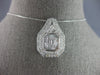 EXTRA LARGE 2.20CT DIAMOND 14KT WHITE GOLD ROUND & BAGUETTE DOUBLE HALO PENDANT