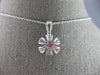 ESTATE .63CT DIAMOND 14KT WHITE GOLD 3D ROUND & BAGUETTE FLOWER FLOATING PENDANT