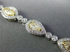 ESTATE LONG 6.23CT WHITE & FANCY YELLOW DIAMOND 18KT WHITE GOLD TENNIS BRACELET