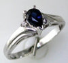 .03CT DIAMOND & AAA SAPPHIRE 14KT WHITE GOLD PEAR SHAPE & PRINCESS 3 STONE RING