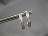 ESTATE .20CT DIAMOND 14KT WHITE GOLD 3D BAGUETTE CHANNEL OVAL HANGING EARRINGS