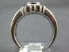 WIDE 2.19CT DIAMOND & EMERALD 18KT WHITE GOLD OVAL ROUND & BAGUETTE FLOWER RING