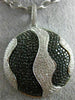 LARGE 4.51CT WHITE & BLACK DIAMOND 18KT WHITE & BLACK GOLD CIRCULAR WAVE PENDANT