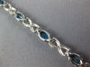 LONG 5.05CT DIAMOND & AAA BLUE TOPAZ 14KT WHITE GOLD OVAL X LOVE TENNIS BRACELET