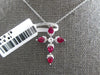 1CT DIAMOND & AAA RUBY 18KT WHITE GOLD ROUND & PEAR SHAPE CROSS FLOATING PENDANT