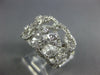 WIDE .76CT DIAMOND 18KT WHITE GOLD MULTI ROW LOVE KNOT ETOILE ANNIVERSARY RING