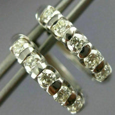 ESTATE .80CT DIAMOND 18KT WHITE GOLD CHANNEL 5 STONE ROUND HUGGIE HOOP EARRINGS