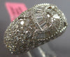 LARGE 5.12CT DIAMOND 18KT WHITE GOLD ROUND & BAGUETTE CRISS CROSS INFINITY RING