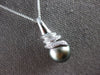 LARGE .07CT DIAMOND & AAA TAHITIAN PEARL 14KT WHITE GOLD SWIRL FLOATING PENDANT