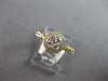 ESTATE .13CT DIAMOND 14KT WHITE GOLD 3D ROUND CLUSTER INVISIBLE HALO FUN RING