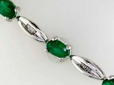 5.20CT DIAMOND & AAA EMERALD 14KT WHITE GOLD 3D OVAL & BAGUETTE TENNIS BRACELET