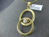 ESTATE LARGE .19CT DIAMOND 18K YELLOW GOLD FLOWER CIRCULAR LOVE KNOT FUN PENDANT