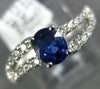 .97CT DIAMOND & AAA SAPPHIRE 18KT WHITE GOLD OVAL & ROUND SWIRL ENGAGEMENT RING