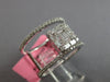 LARGE .76CT WHITE DIAMOND 18KT WHITE GOLD 3D ROUND & BAGUETTE ANNIVERSARY RING