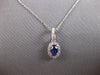 .91CT DIAMOND & AAA CEYLON SAPPHIRE 14KT WHITE GOLD OVAL HALO FLOATING PENDANT