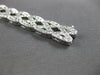 WIDE 4.20CT DIAMOND 14KT WHITE GOLD ROUND CRISS CROSS INFINITY TENNIS BRACELET