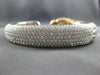 25.08CT WHITE & PINK DIAMOND & AAA EMERALD 18K WHITE & ROSE GOLD BANGLE BRACELET