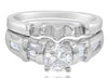 .75CT DIAMOND 14KT WHITE GOLD TRILLION & BAGUETTE INVISIBLE ENGAGEMENT RING SET