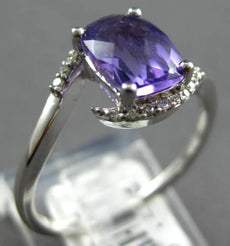 1.67CT DIAMOND & AAA AMETHYST 14KT WHITE GOLD CUSHION & ROUND CRISS CROSS RING
