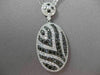 ESTATE LARGE 5.18CT BLACK & WHITE DIAMOND 18KT WHITE GOLD OVAL FLOATING NECKLACE