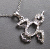 ESTATE .19CT DIAMOND 14KT WHITE GOLD 3D FUN LOVEBIRD FLOATING PENDANT