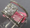 LARGE .76CT WHITE DIAMOND 18KT WHITE GOLD 3D ROUND & BAGUETTE ANNIVERSARY RING