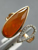 .09CT DIAMOND & AAA ORANGE AGATE 14KT ROSE GOLD PEAR SHAPE CRISS CROSS FUN RING