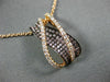 LARGE .75CT WHITE & PINK DIAMOND 18KT ROSE & BLACK GOLD CRISS CROSS WAVE PENDANT
