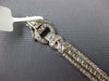 WIDE 4.80CT DIAMOND 18KT WHITE GOLD ROUND & BAGUETTE LOVE KNOT TENNIS BRACELET
