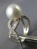 LARGE .21CT DIAMOND & AAA SOUTH SEA PEARL 18KT WHITE GOLD 3D INFINITY LOVE RING