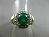 ESTATE 1.82CT ROUND & BAGUETTE DIAMOND & AAA EMERALD 14K TWO TONE GOLD HALO RING