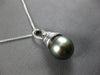 LARGE .07CT DIAMOND & AAA TAHITIAN PEARL 14KT WHITE GOLD SWIRL FLOATING PENDANT