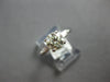 ESTATE .99CT DIAMOND 14KT WHITE GOLD 3D ROUND & BAGUETTE 3 STONE ENGAGEMENT RING
