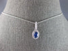.91CT DIAMOND & AAA CEYLON SAPPHIRE 14KT WHITE GOLD OVAL HALO FLOATING PENDANT