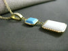 ESTATE .10CT DIAMOND TURQUOISE & WHITE QUARTZ 14KT YELLOW GOLD FLOATING PENDANT