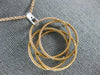 ESTATE LARGE .18CT DIAMOND 18K WHITE AND ROSE GOLD 3D MESH FLOWER ETOILE PENDANT