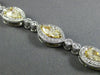 ESTATE LONG 6.23CT WHITE & FANCY YELLOW DIAMOND 18KT WHITE GOLD TENNIS BRACELET