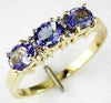 1.05CT DIAMOND & AAA TANZANITE 14KT YELLOW GOLD 3D OVAL & ROUND THREE STONE RING